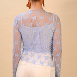 Transparante kante blauwe top