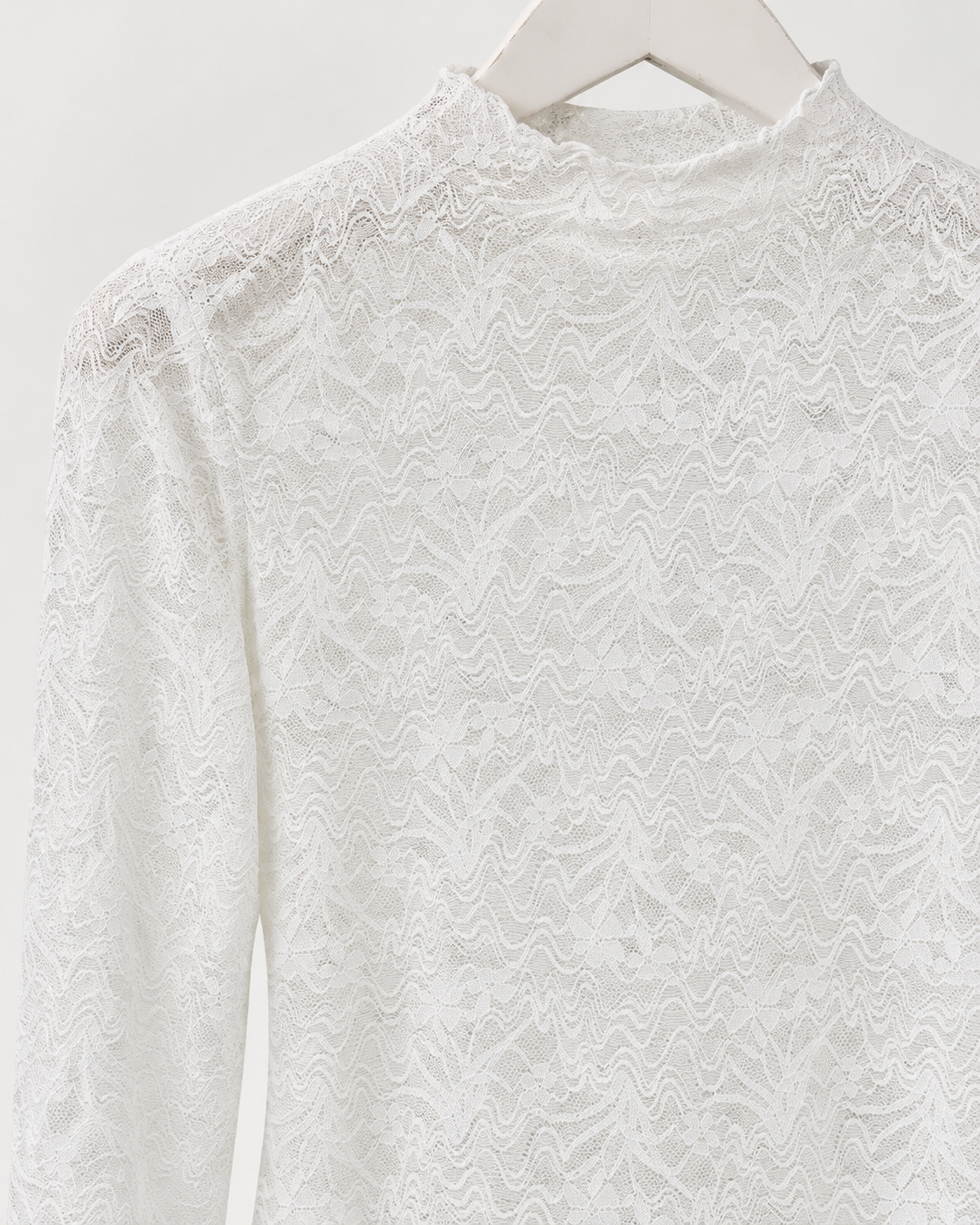 Witte kanten top dames – detail van het kant
